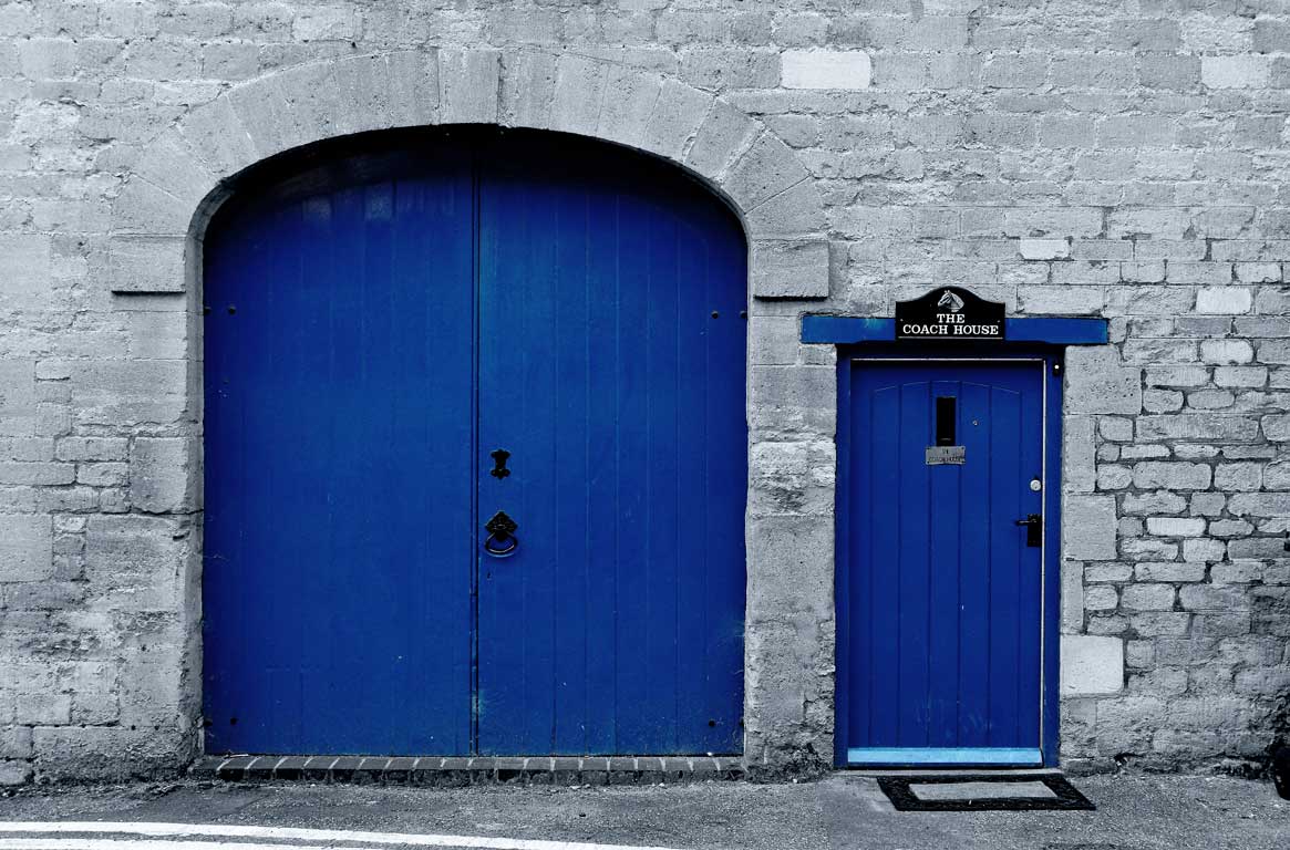 [A photograph of a door; which way does it open?]